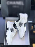 C white & black trainers