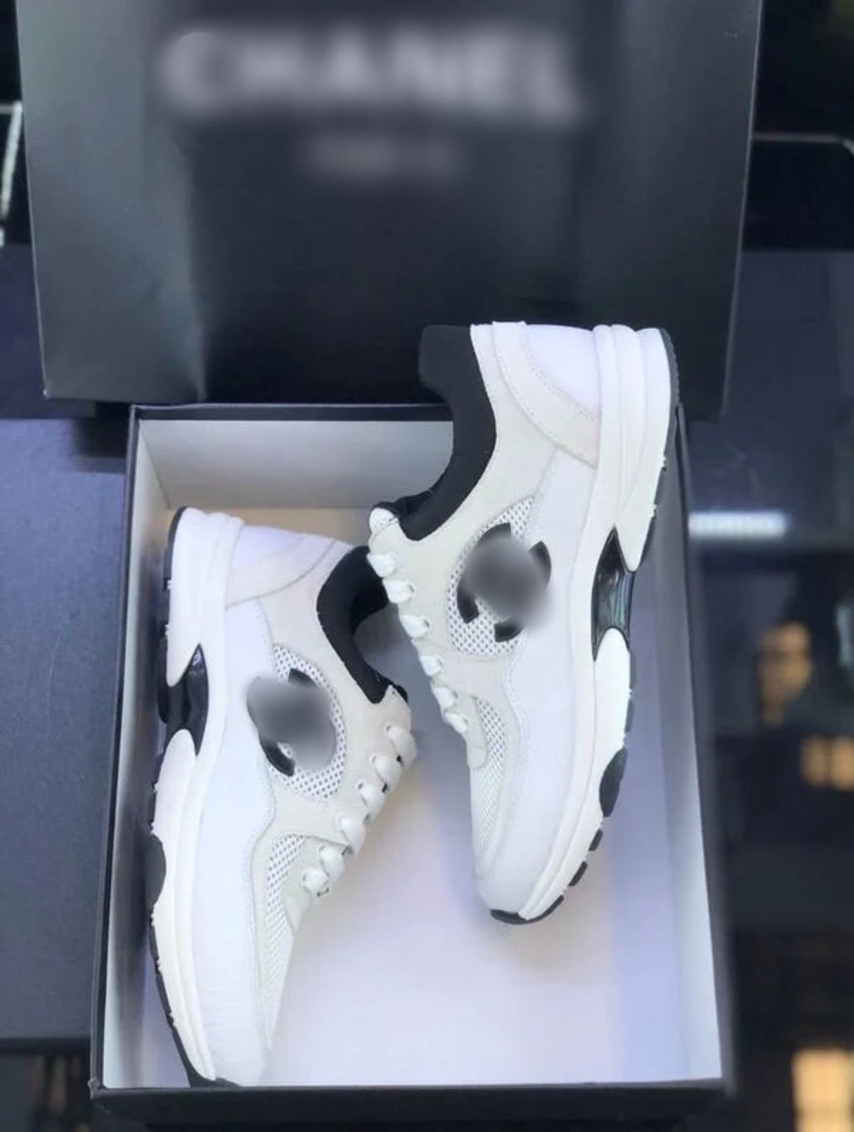 C white & black trainers